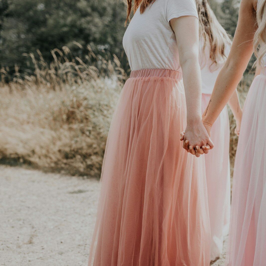 woman in white and pink dress